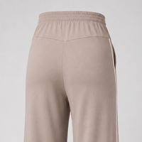 detalle Pantalón materno palazzo beige raya blanca